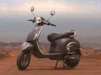 Revolutionizing Commutes: India's Electric Scooters & Bikes - Coches/Motos