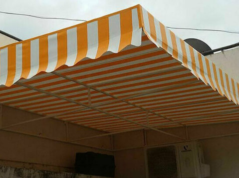Awnings in Pune | Conical Tensile structure car parking shed - Services: Other