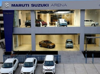 Contact Mega Motors for Ertiga Car Showroom in Gomtinagar - Autod/Mootorrattad