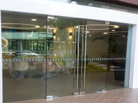 Swing Glass Door Supplier in Singapore - Autres
