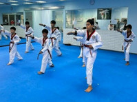 TKD blends tradition and modernity 4student health - Sport/Yoga
