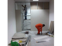 wall partitions installer dubai apartments flats wearhouse - Muu