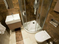 Nudesign Bathroom Renovations (2) - Building & Renovation