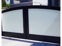 Mazal Garage Doors and Gates (1) - Windows, Doors & Conservatories