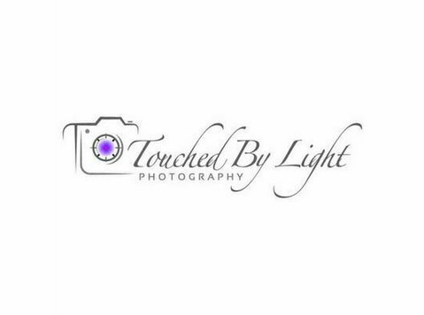 Touched by light photography - فوٹوگرافر