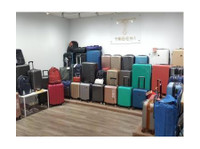 Trochi Luggage (1) - Towary luksusowe