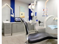 Conde Duque Dental Clinic (5) - Dentistes