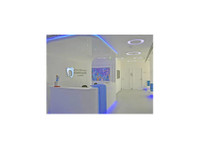 dental experts center l/l/c (2) - Zubní lékař