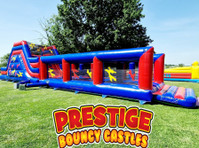 Prestige Bouncy Castles, Funfair & Hire (1) - Children & Families