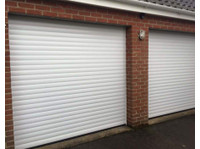 SA Garage Doors (1) - Janelas, Portas e estufas