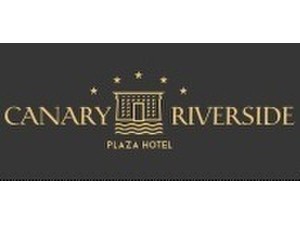 Canary Riverside Plaza Hotel - Hotels & Hostels