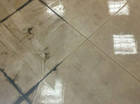 Silver Olas Carpet Tile Flood Cleaning (1) - Уборка