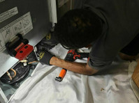 Guinco Service Appliance Repair (3) - بجلی کا سامان