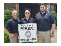 Wayne Songy & Associates (1) - Property Management