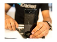 iCracked iPhone Repair Daytona Beach (1) - Продажа и Pемонт компьютеров