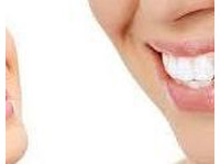 Beach Smile Dental (2) - ڈینٹسٹ/دندان ساز