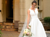 Azaria Bridal - Wedding Gowns & Tuxedo Rental (7) - Haine