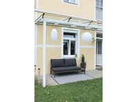 Schöne Gartenwohnung in der Villa Hohenheim - Zu Vermieten