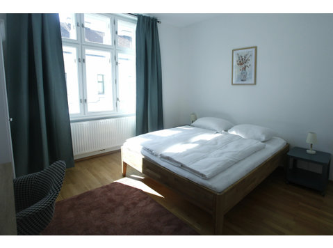 Cozy apartment with living room and balcony - For Rent