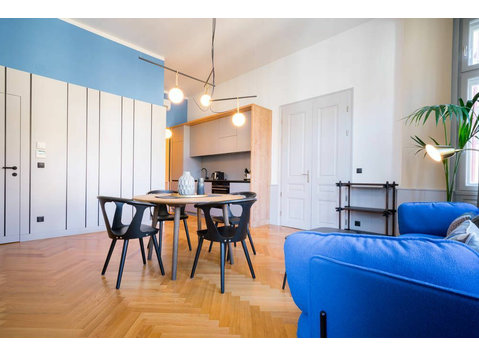 Elegantly furnished accommodation with balcony and air… - For Rent
