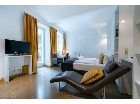 Superb air-conditioned apartment with own garden - Annan üürile