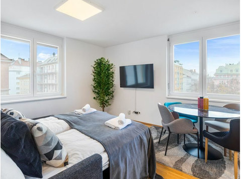 Zwei-Schlafzimmer-Apartment mit Terrasse und Parkblick - Zu Vermieten