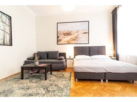 Familienapartment mit 2 separaten Schlafzimmern - Apartments