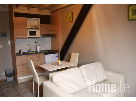 Maisonette Studio mit Doppelbett - Wohnungen