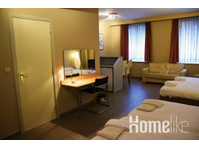 Family studio with 4 single beds - Apartemen