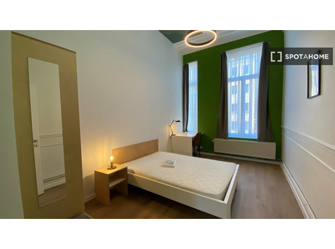 Chambres à louer dans une résidence à Ixelles, Bruxelles - À louer