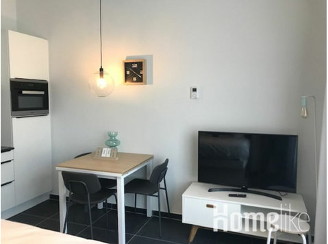 Modern studio apartment - 	
Lägenheter