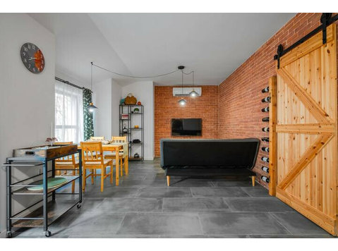 Brick Haven: Contemporary Urban Living Redefined - For Rent