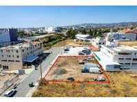 The property is an industrial plot in Agios Theodoros. 

It… - Huse
