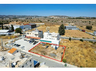 The property is an industrial plot in Agios Theodoros. 

It… - בתים