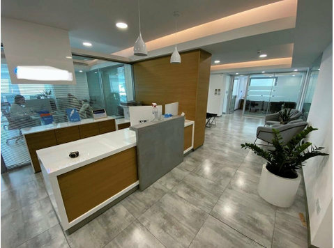 Located in the Agia Trias area of Limassol, the offices are… - Casas