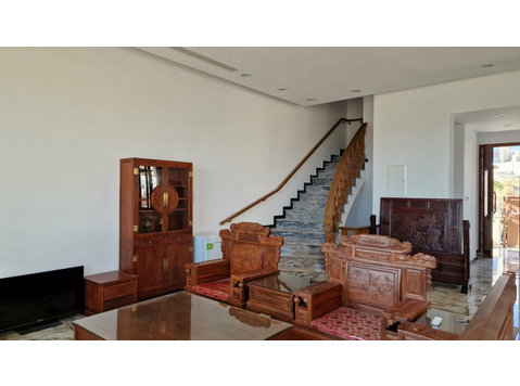 The property is set on 3 levels, the ground floor has a… - Müstakil Evler