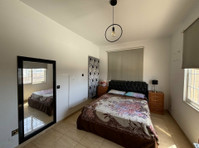 This charming two bedroom apartment in Ekali offers a cozy… - Σπίτια
