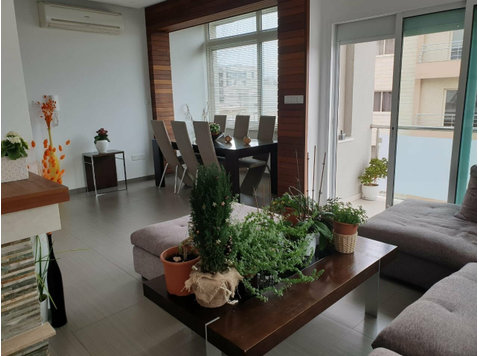 A Spacious Top Floor Three Bedroom Apartment located in a… - Houses