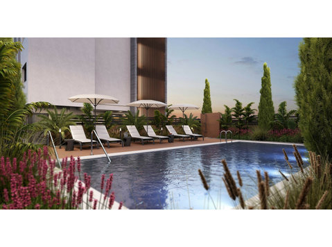 A new premium-class residential complex in Limassol located… - Casas