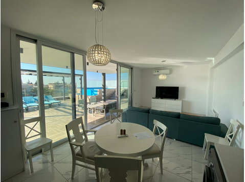 For sale is a stunning penthouse apartment located in the… - Müstakil Evler