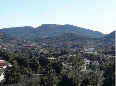 Land of 6,355 sqm located in Monagrouli village of… - Houses