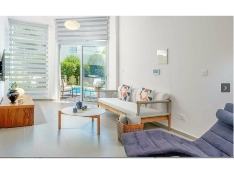 Located on the Ground floor the apartment has a cool pool… - Maisons