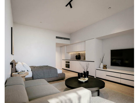 The residential complex features 25 serviced studio and… - Houses