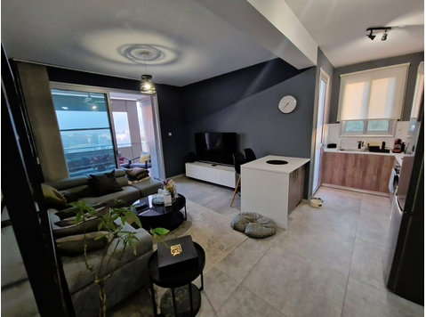 This modern one-bedroom apartment is located on the 1st… - Case