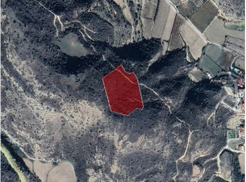 Tourist land in Pissouri village of Limassol District. 
It… - Majad