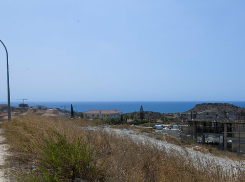 Panoramic sea view plot in Ayios Tychonas - Земјиште