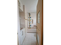 A fully furnished townhouse with a communal pool and… - گھر