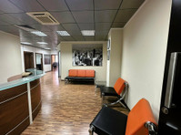 This office space is located in the centre of… - Maisons