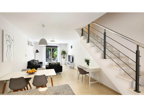 Beautifully finished and modern in style, this two bedroom… - Houses