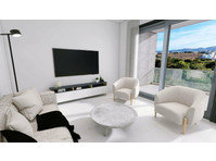 Cozy Two-Bedroom Apartment in Chloraka Village

This… - Houses